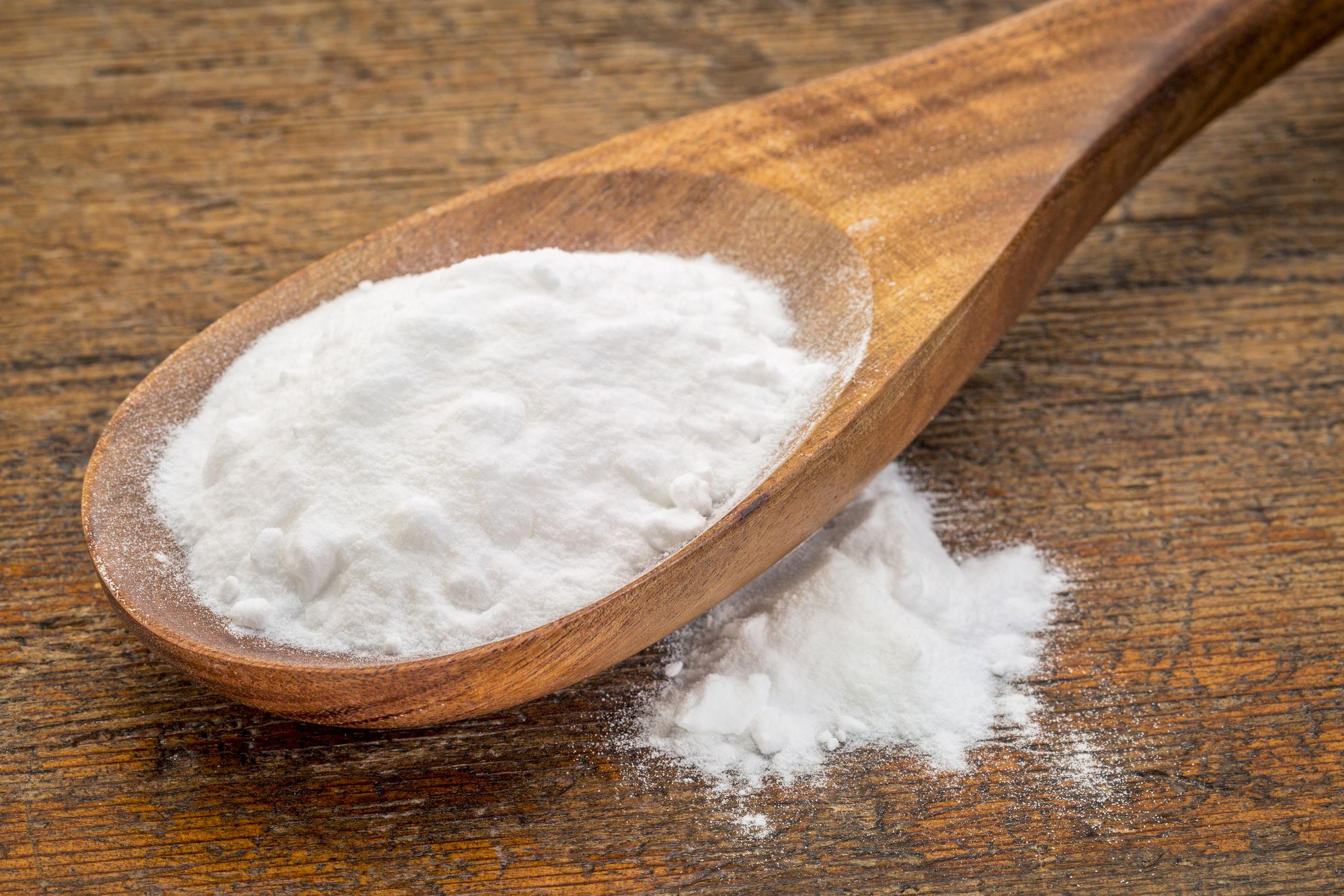 baking soda on a wooden spoon