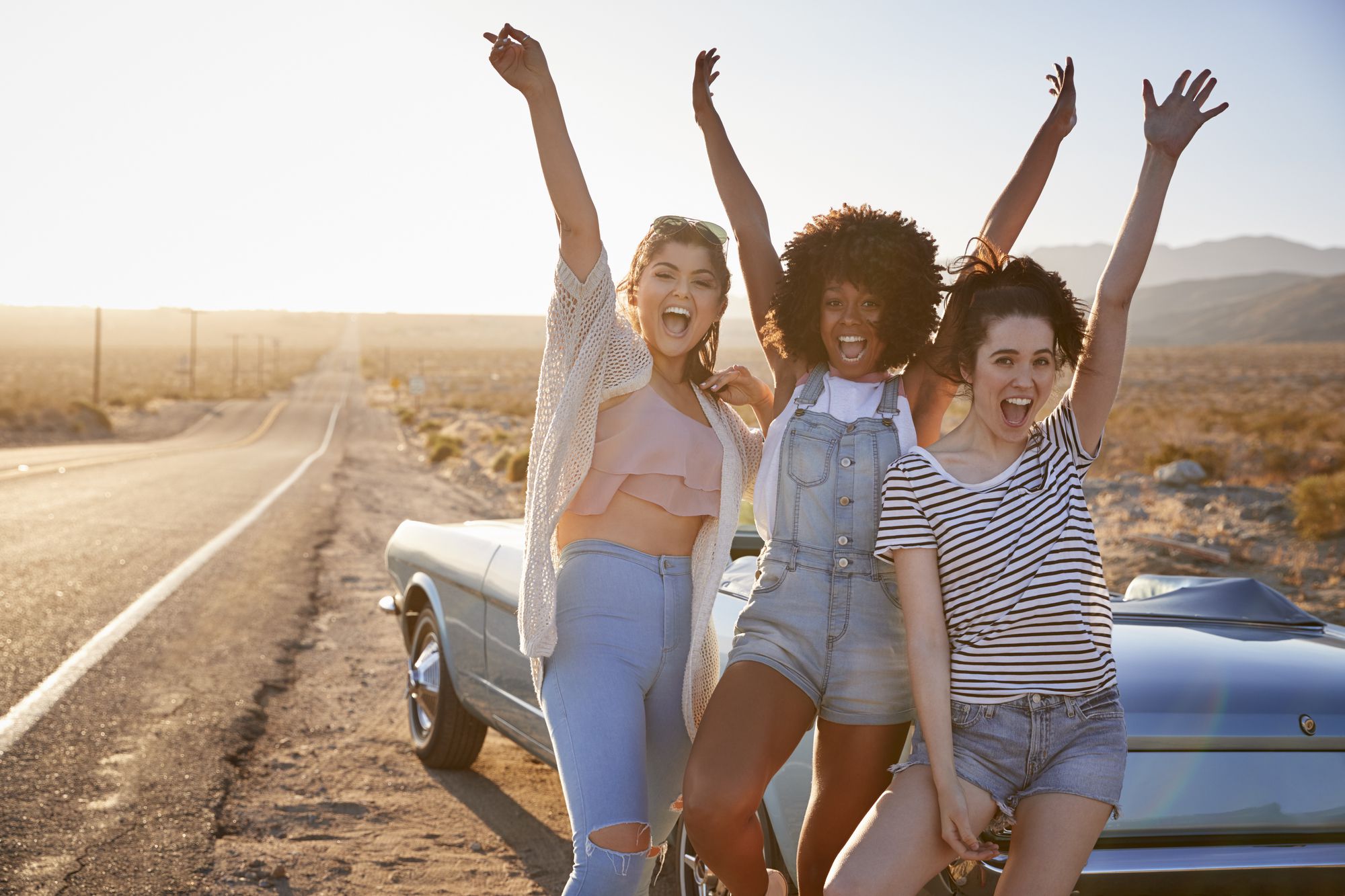 Portrait Of Female Friends Enjoying Road Trip